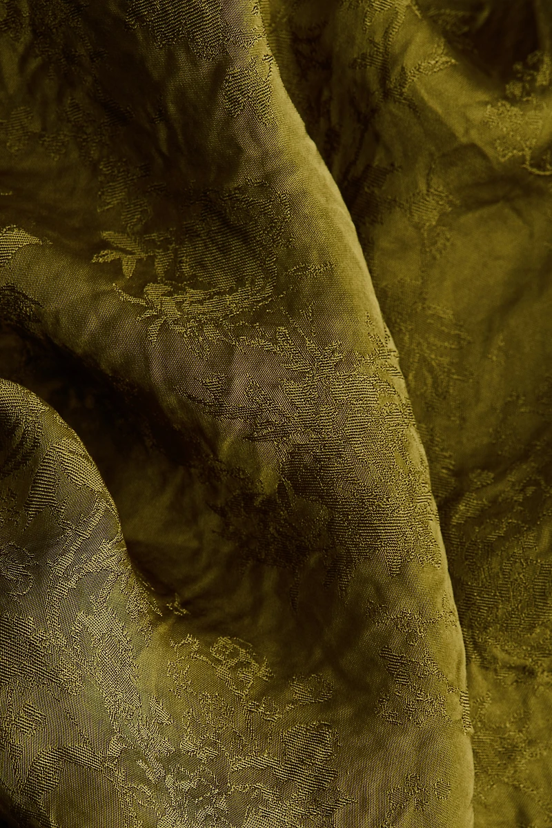 Blouse asymétrique en tissu jacquard