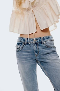 Jean taille basse évasé