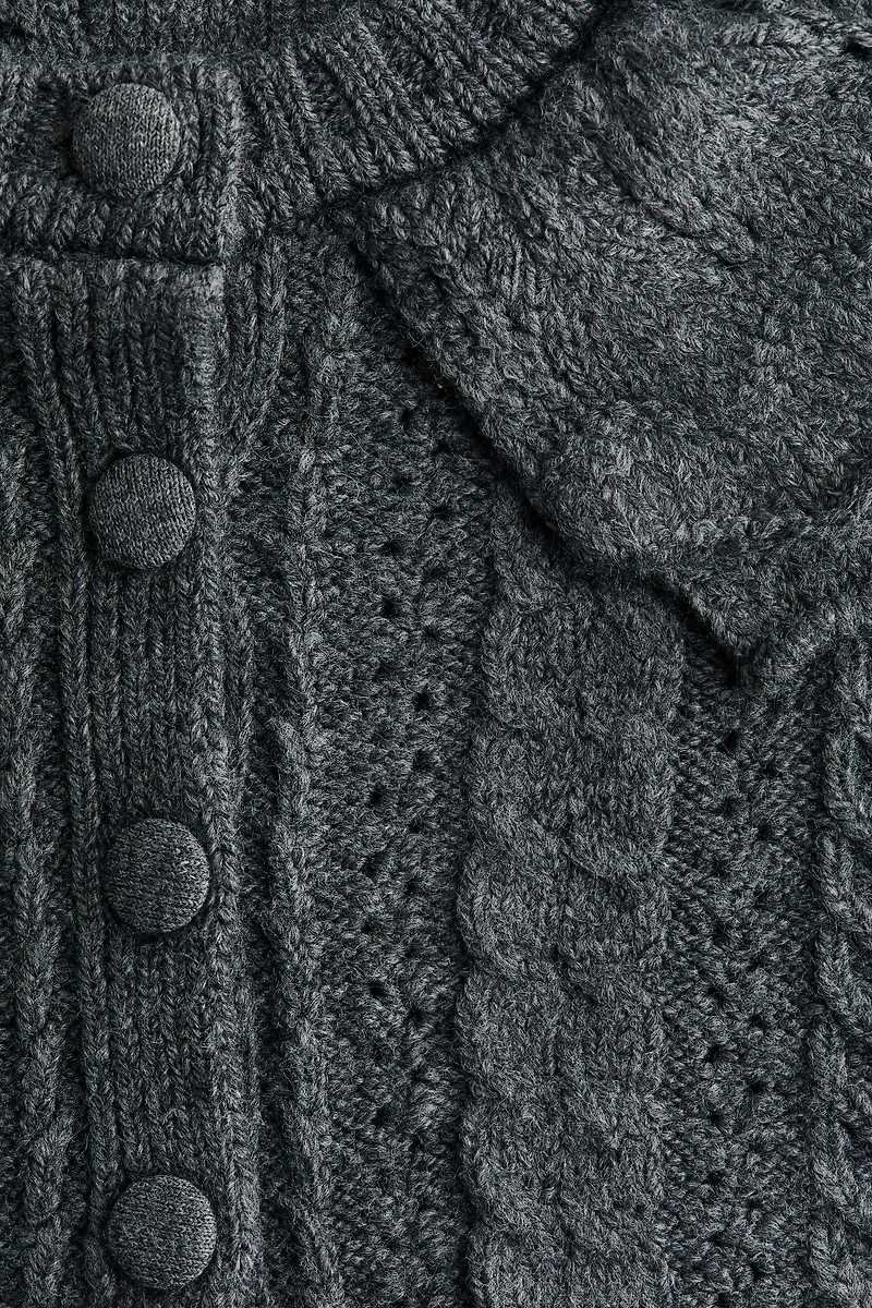 Gilet en maille torsadée avec col