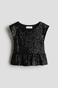 Haut péplum à sequins