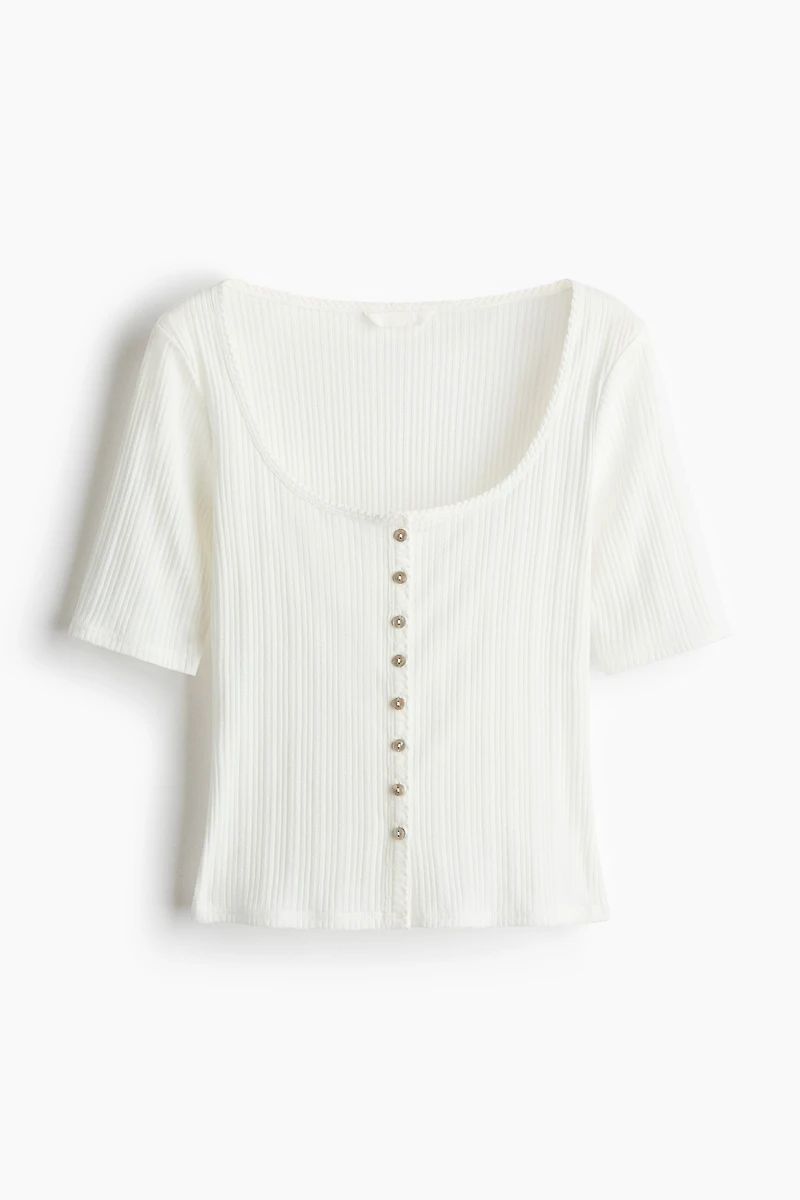 Haut en tricot pointelle