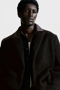 Manteau à fermeture droite en laine mélangée