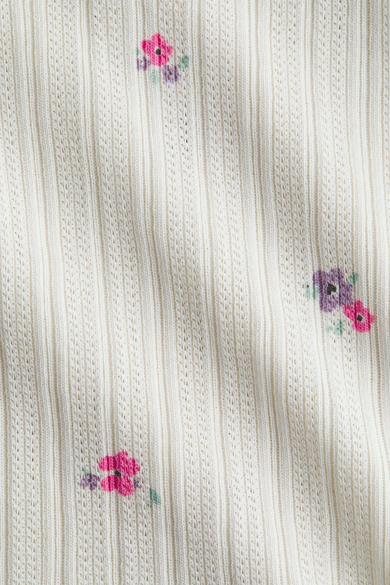 Camisole volantée en tricot pointelle