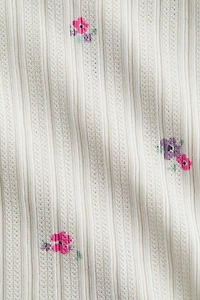 Camisole volantée en tricot pointelle