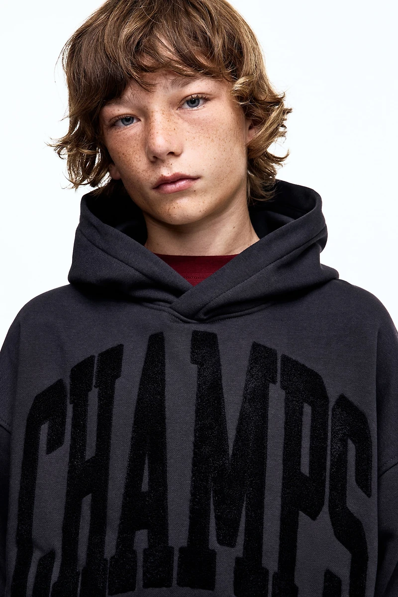 Chandail à capuchon