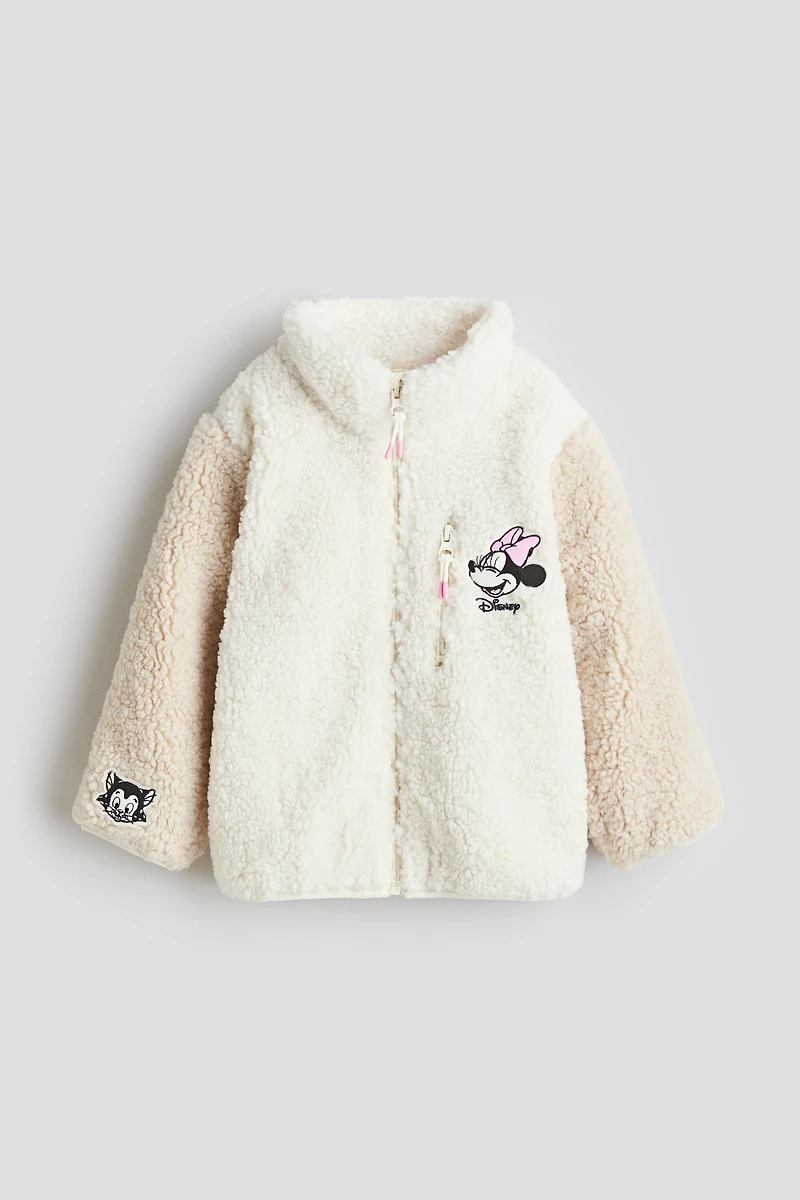 Veste en tissu polar avec appliqués