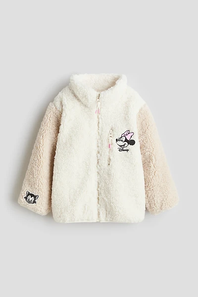 Veste en tissu polar avec appliqués