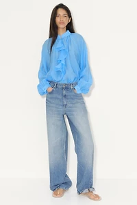 Blouse à volant en lyocell mélangé