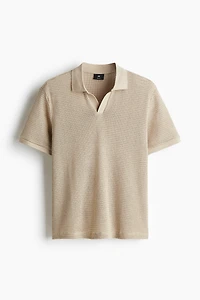 Polo classique en tricot ajouré
