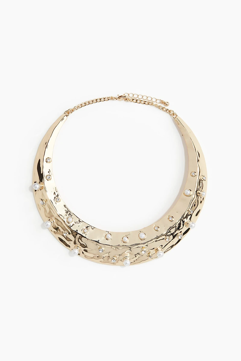 Collier rigide orné de strass