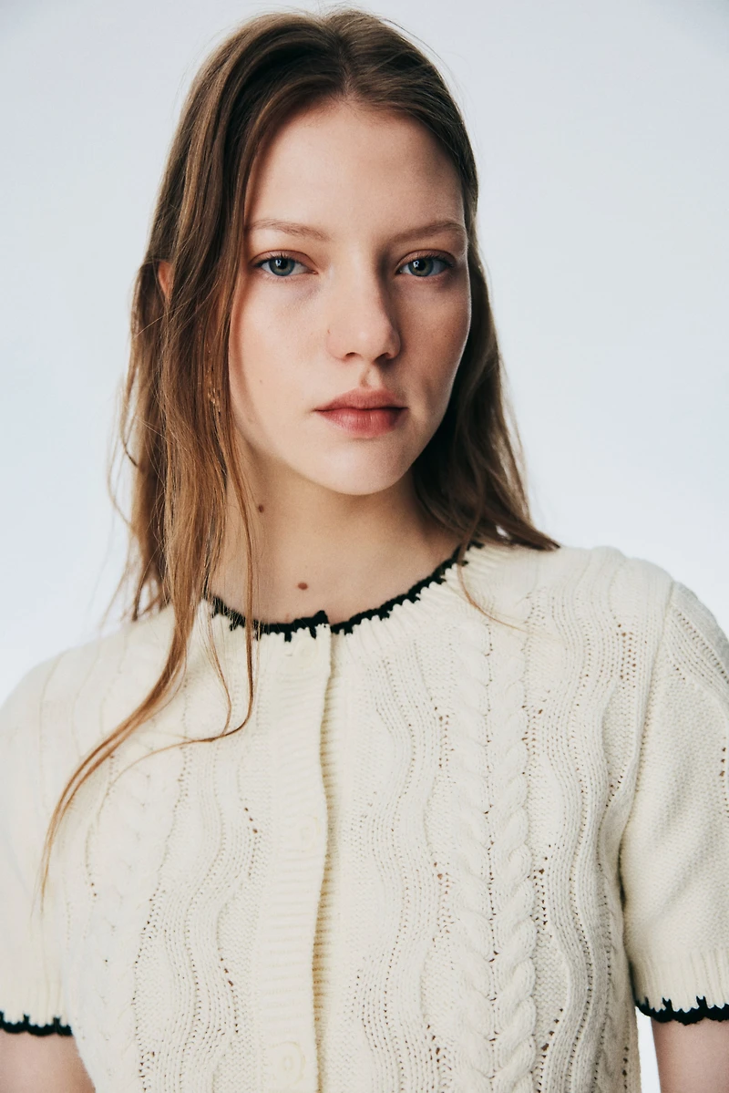 Gilet en tricot torsadé