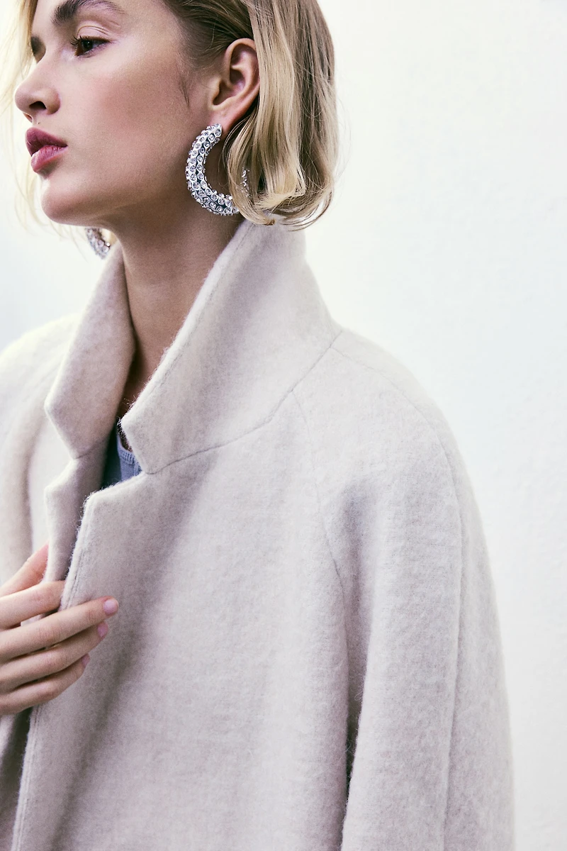 Manteau à fermeture croisée
