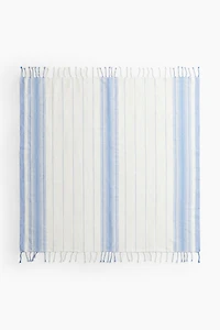Serviette de plage en tissu jacquard