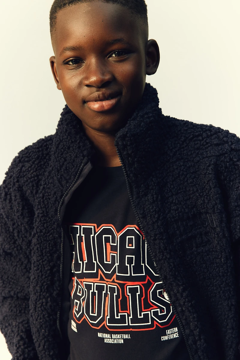 Veste en polar avec appliqués