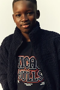 Veste en polar avec appliqués