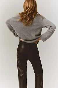 Pantalon coupe bottillon en tissu enduit