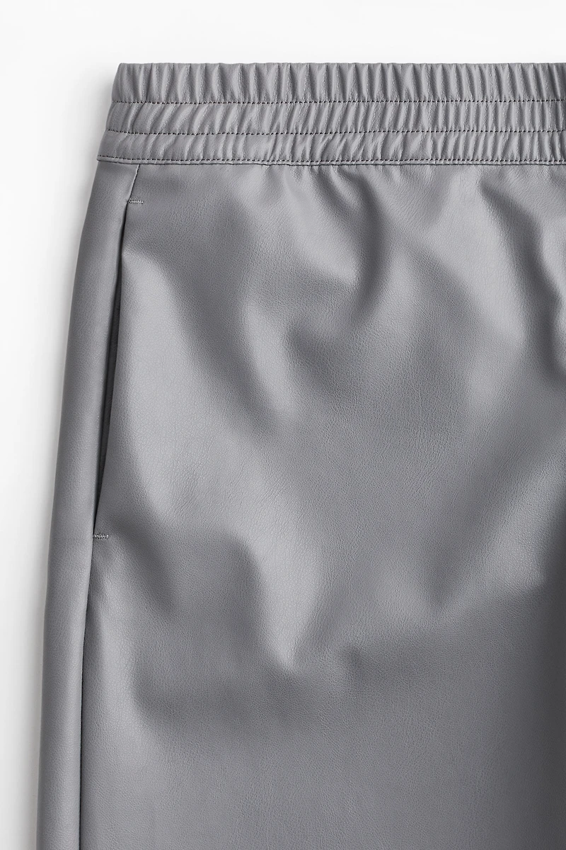 Pantalon de jogging large en tissus enduit