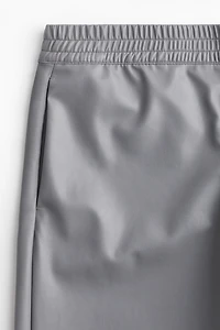 Pantalon de jogging large en tissus enduit