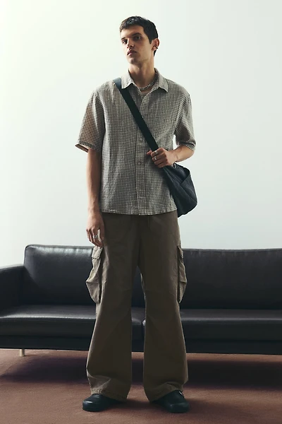 Pantalon cargo ample à effet délavé