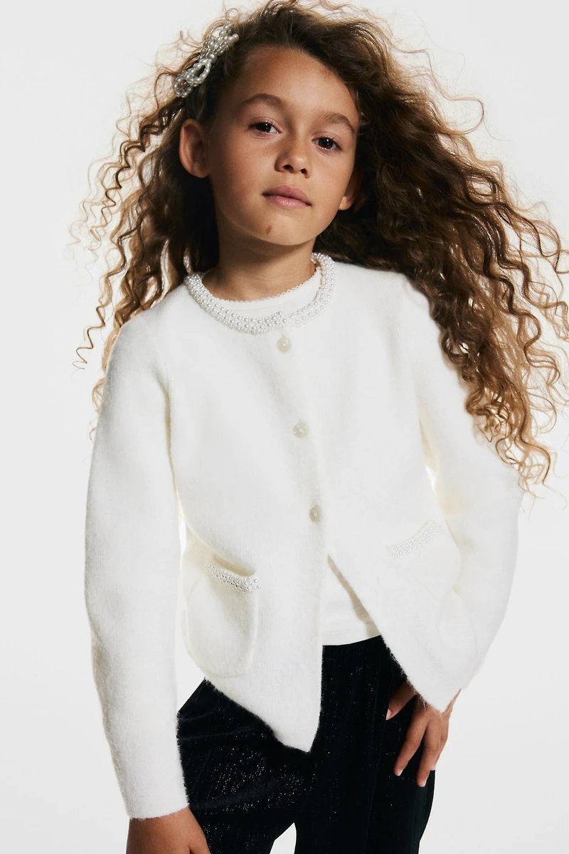 Chandail avec perles fantaisie