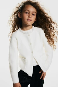 Chandail avec perles fantaisie