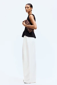 Sleeveless Peplum Top