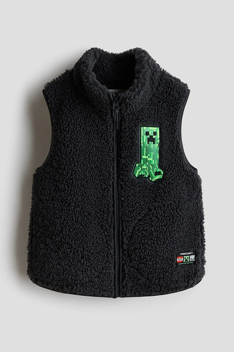 Veste sans manches en polar avec motif