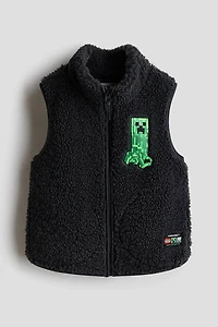 Veste sans manches en polar avec motif