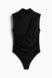 Maillot string à effet drapé