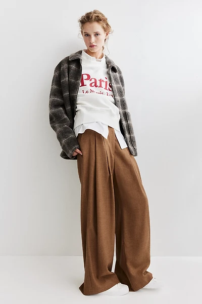 Pantalon à pinces en sergé