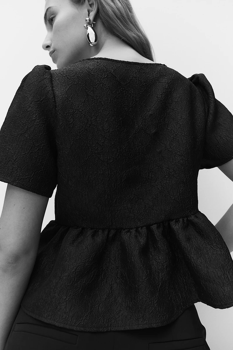 Blouse péplum en brocart