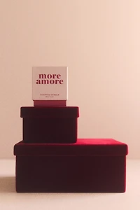 Bougie parfumée dans un pot en verre