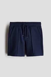 Short en piqué avec cordon de serrage