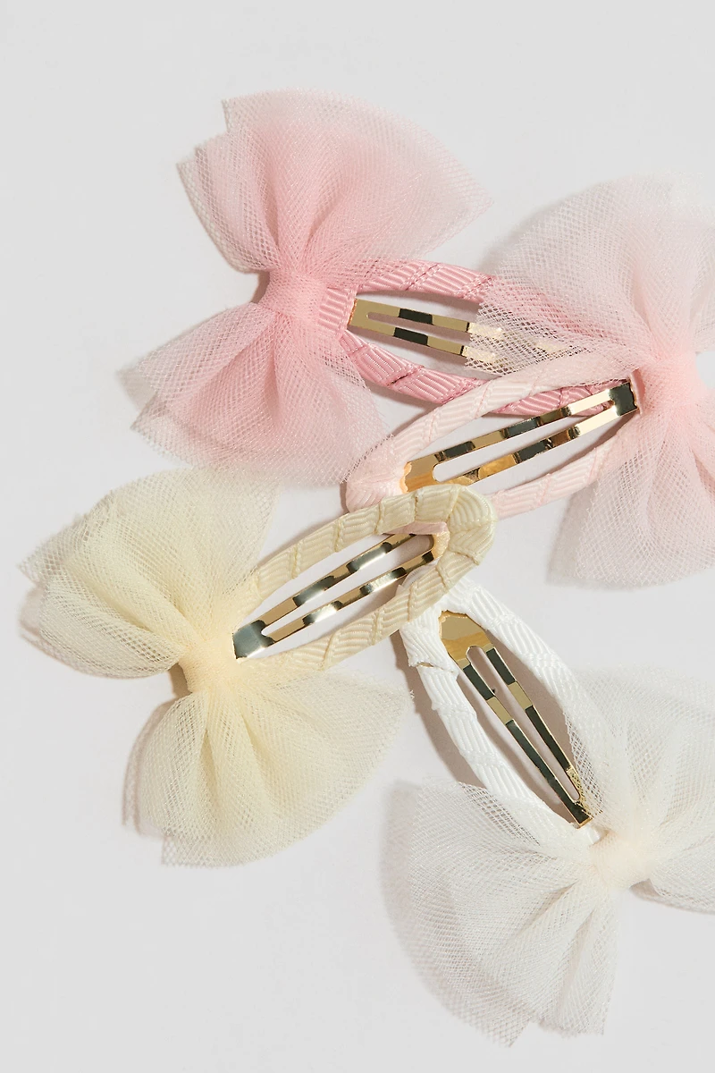 Lot de 4 barrettes avec appliqué