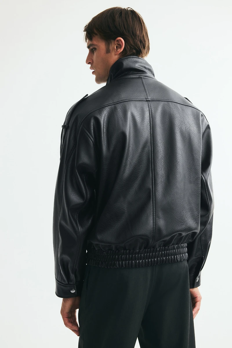 Veste de style motard en tissu enduit