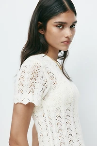 Haut en tricot pointelle