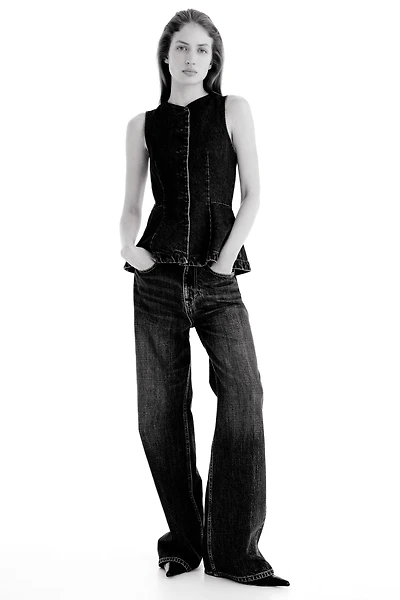 Gilet sans manches avec basque