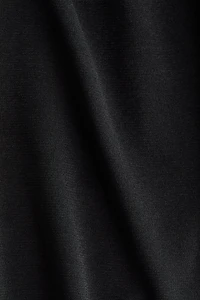 Pantalon à effet drapé en fin tricot