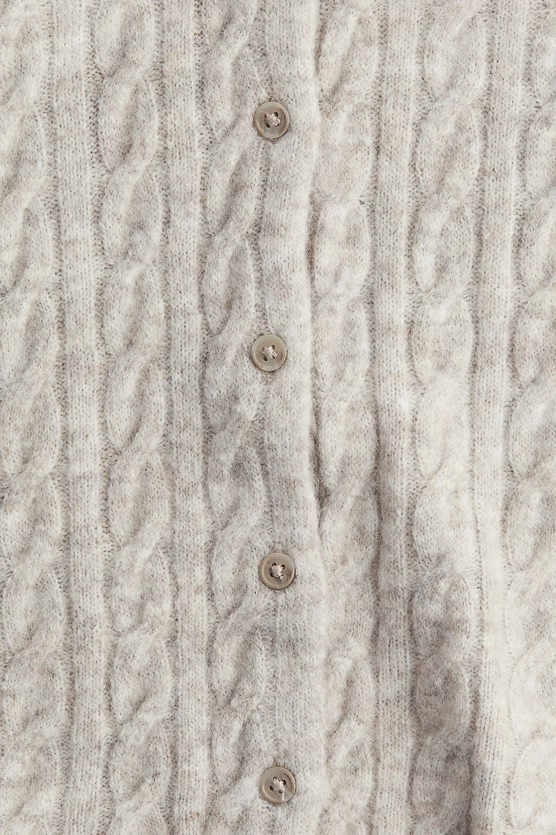 Gilet en tricot torsadé