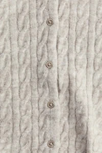 Gilet en tricot torsadé