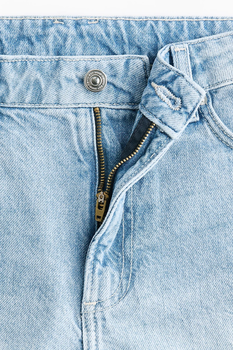 Raw-edge denim shorts