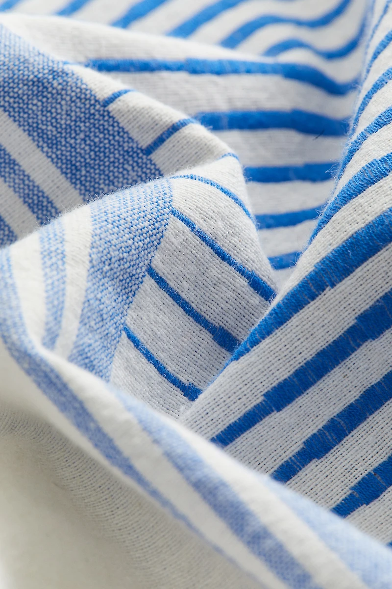 Serviette de plage en tissu jacquard