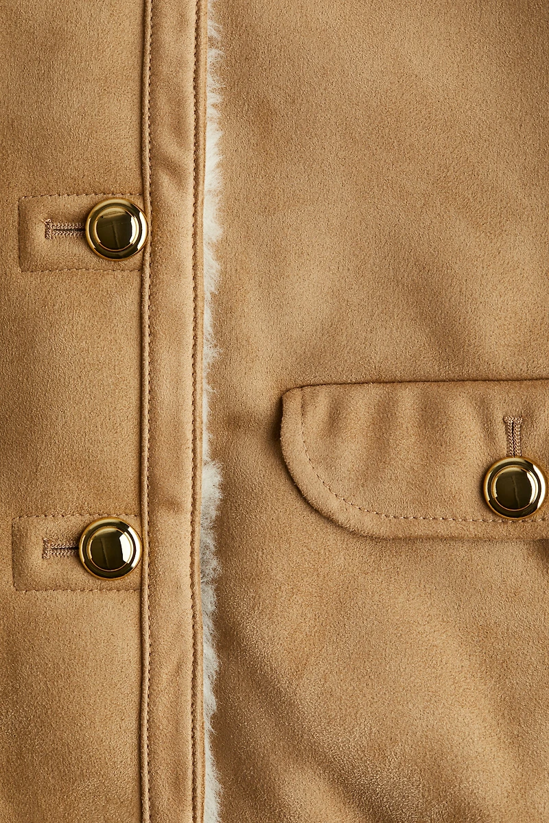 Veste doublée de tissu peluche