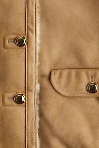 Veste doublée de tissu peluche