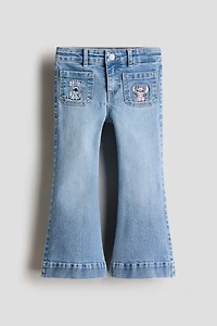 Jean évasé avec motifs brodés