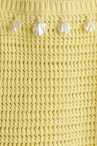 Haut ornementé en tricot