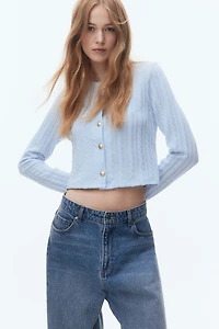 Gilet d'apparence tricot torsadé