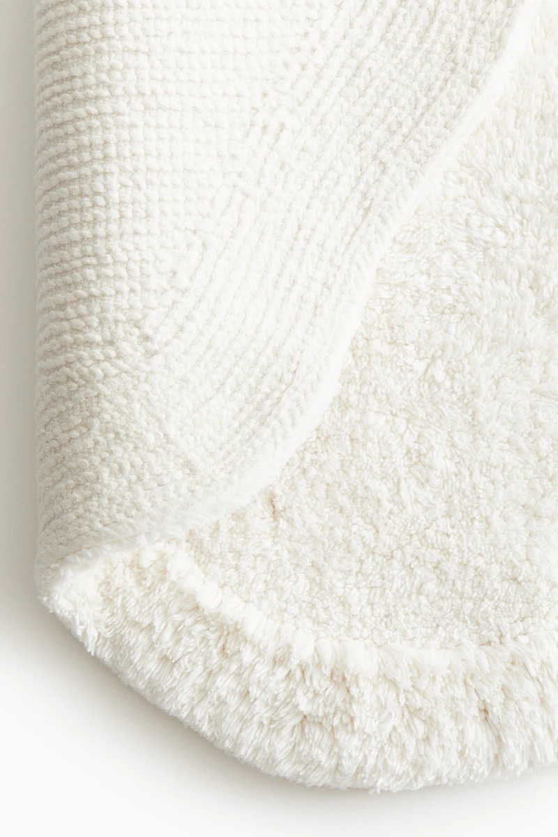 Tapis de bain en coton touffeté