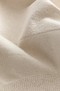 Housse de coussin brodée