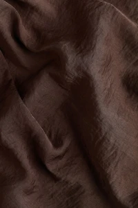 Haut dos nu en satin